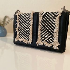 Black and white purse with strap